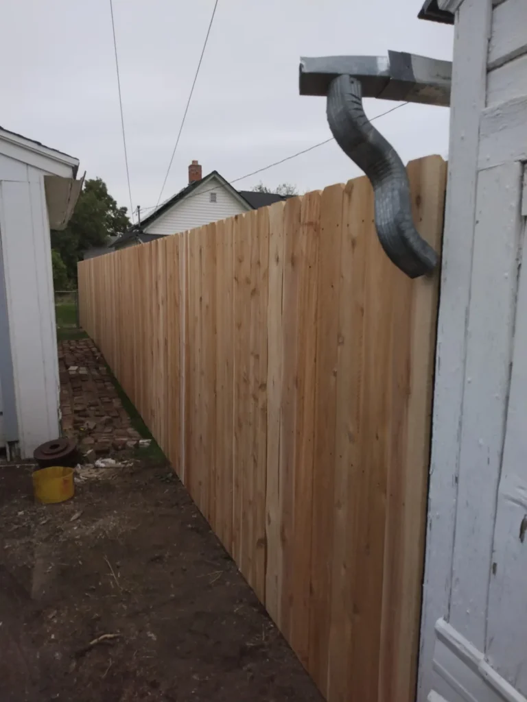 Wood privacy along a corner lot — 4