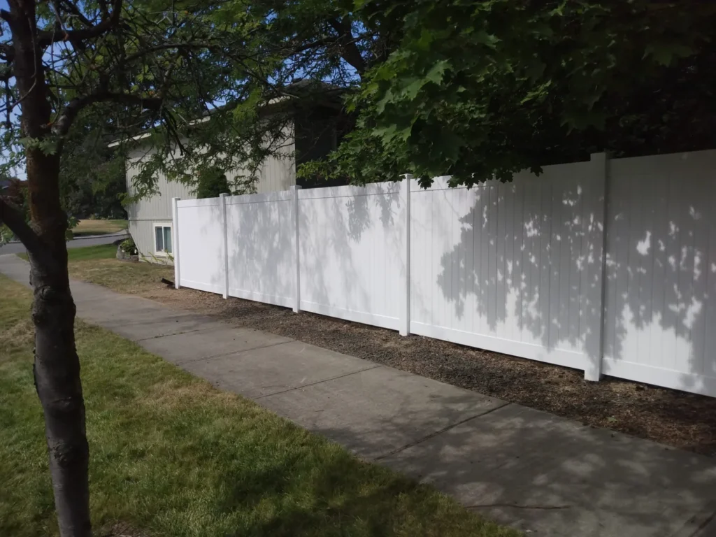 White vinyl along the sidewalk — 2